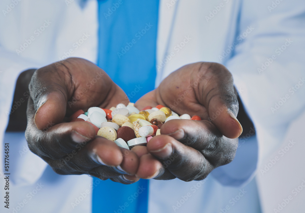 Pill in a hand isolated on white background. Doctor. Pill Pill in a hand isolated on white background. Doctor. Pill