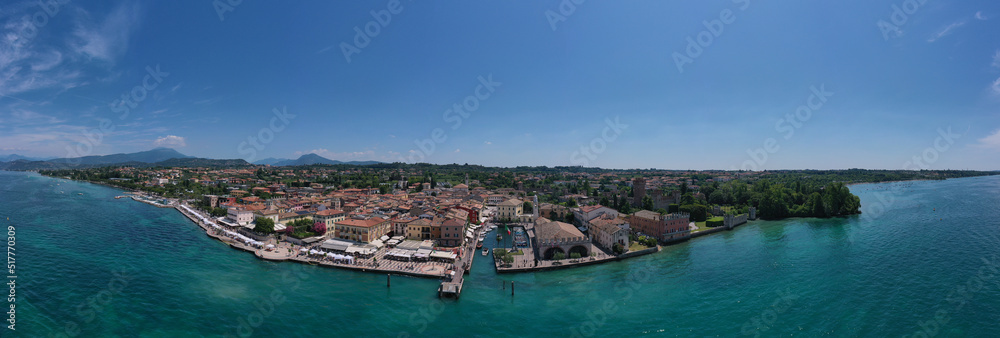 Aerial view of Lazise city, Verona. The historical part of the city of Lazise, coastline. Aerial panorama of Lazise town on Lake Garda Italy.