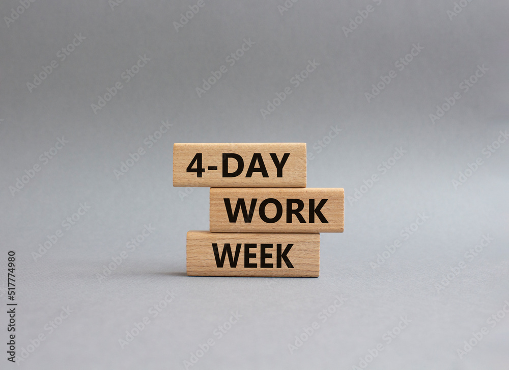 4-day work week symbol. Concept words 4-day work week on wooden blocks. Beautiful grey background. Business and 4-day work week concept. Copy space 4-day work week symbol. Concept words 4-day work week on wooden blocks. Beautiful grey background. Business and 4-day work week concept. Copy space
