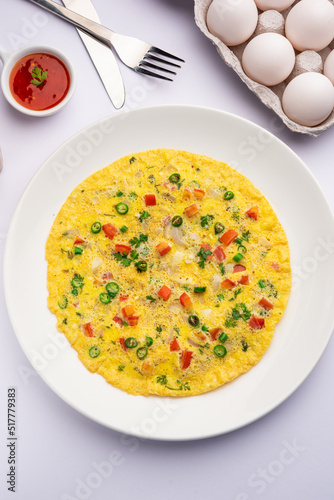 Indian Spiced Masala Omelet filled with fresh vegetable, healthy meal