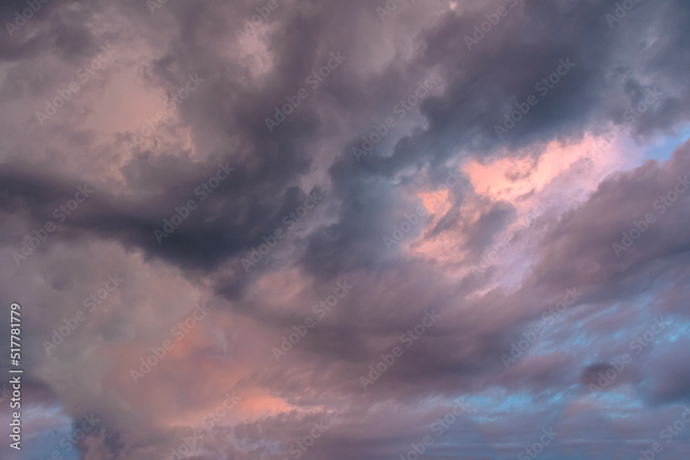 This sky was interesting for its combination of rain-bearing storm clouds and evening sunset
