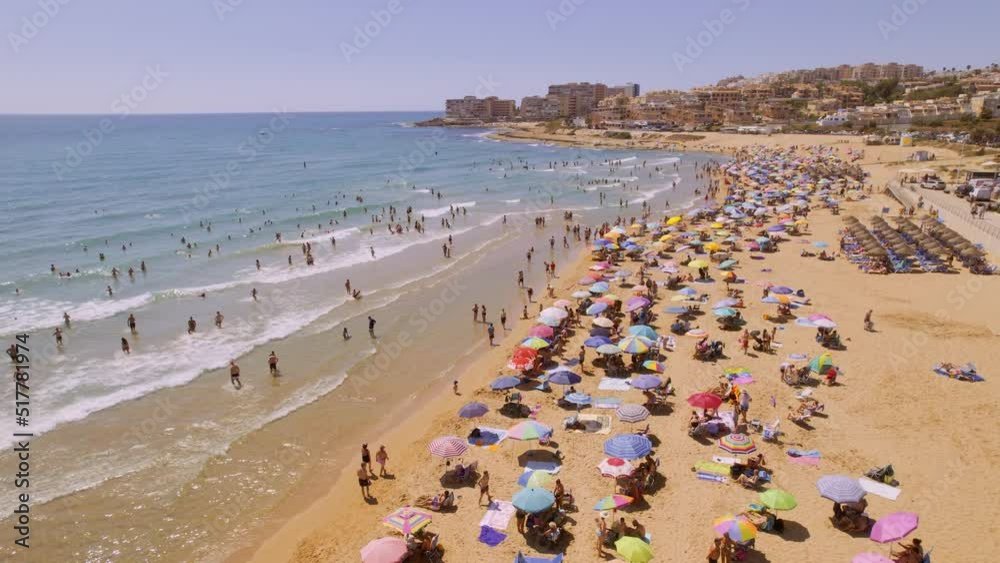Aerial view of Torre La Mata beach, Alicante during sunny summer day. Costa Blanca. Spain. Travel and tourism concept. Cinematic 4K Aerial view of Torre La Mata beach, Alicante during sunny summer day. Costa Blanca. Spain. Travel and tourism concept. Cinematic 4K