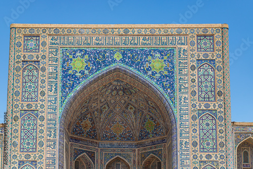 Tillya-Kari madrasah decorated with mosaics on Registan Square in Samarkand, Uzbekistan.