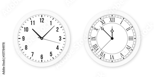 Vintage and modern clock with Roman and Arabic numbers isolated on white background. White wall clock with arrows and Roman and Arabic clock face. Vector