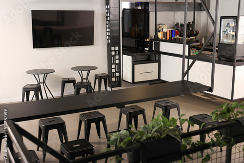 Canvastavla Hostel dining room interior with comfortable furniture and coffee shop