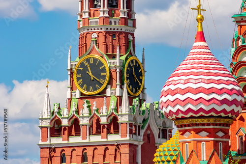 Spasskaya tower of Moscow Kremlin and a tower of Cathedral of Vasily the Blessed (Saint Basil's Cathedral), Russia photo