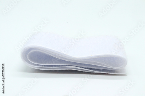 Hook-and-loop fastener white Velcro in closeup on white background