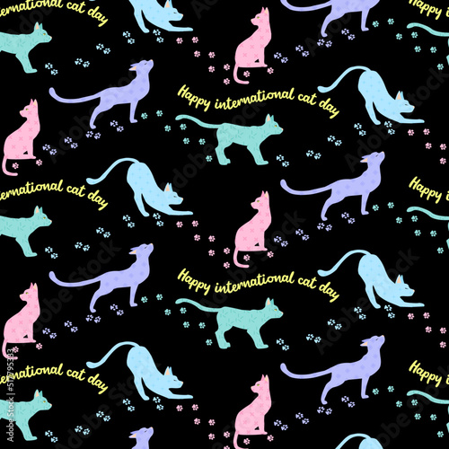 Seamless pattern with cute cats in different poses. Happy international cat day characters design with pastel color paw prints. Adorable pet flat animals isolated on black background.