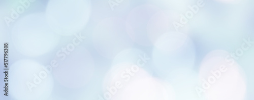 Wide Angle Soft Defocused Light Blue Bokeh Background.