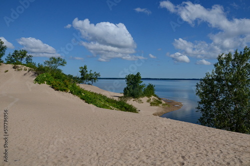 Dunes Beach sand dunes at Sandbanks Provincial Park in Ontario, Canada.   Sandbanks is the largest baymouth barrier dune formation in the world. It is located on Lake Ontario. photo