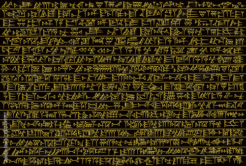 Ancient golden cuneiform sumerian alphabet pattern over black background. Ancient civillization and ancient culture concept photo