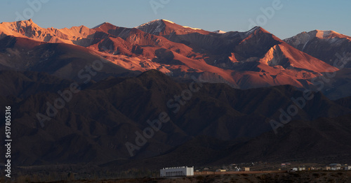 Sunrise of a winter morning with a view of the mountains and a castle in northern Argentina