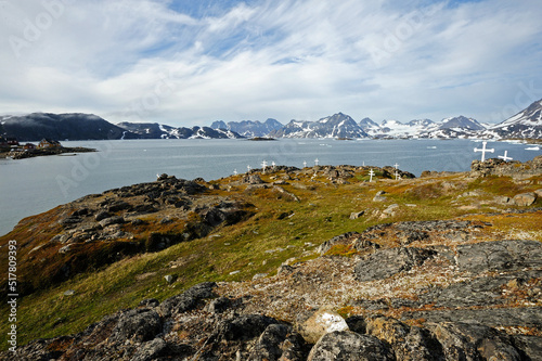 A rudimentary graveyard in the tundra landscape near Kulusuk, eastern Greenland photo