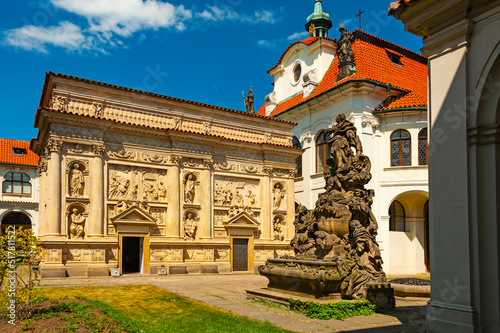 Photography Courtyard of the Loreta monastery in Praha with beautiful baroque buildings and statues