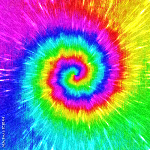 Spiral rainbow tie dye pattern hand dyed on cotton abstract background.