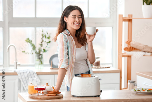 Beautiful young Asian woman...