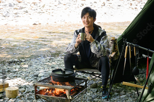 Men's solo camping for all seasons, looking at the camera  © kapinon