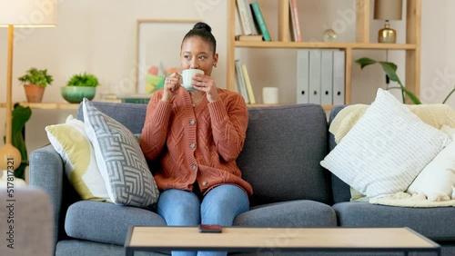 Wallpaper Mural Young woman drinking coffee, relaxing and using a phone to type a text message. Happy female enjoying tea and scrolling through social media and chatting to friends. Relaxed lady searching the web Torontodigital.ca