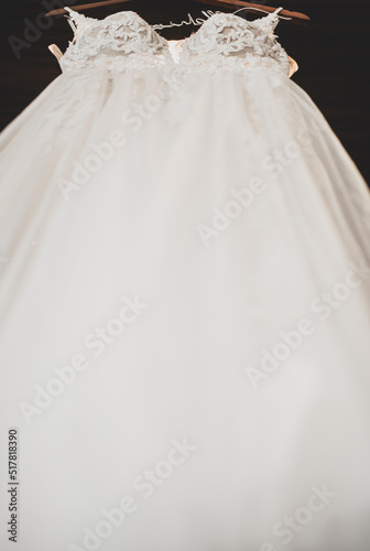 Close up of a wedding dress or bridal gown which is the dress worn by the bride on a wedding ceremony.