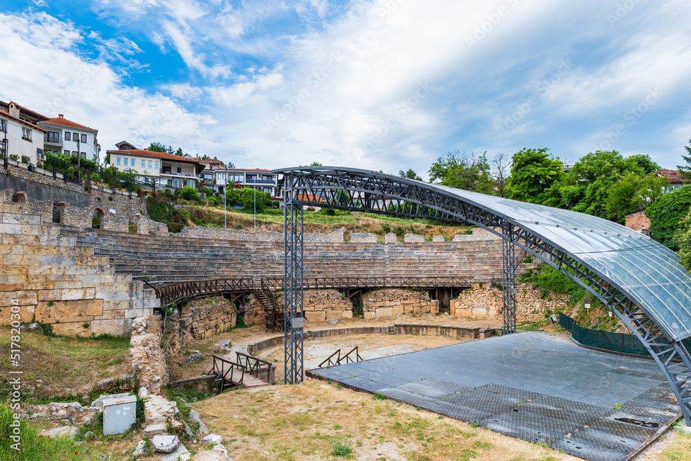 Fototapeta premium Ancient amphitheater or antique theatre of Ohrid with view of old town by Lake Ohrid in Macedonia