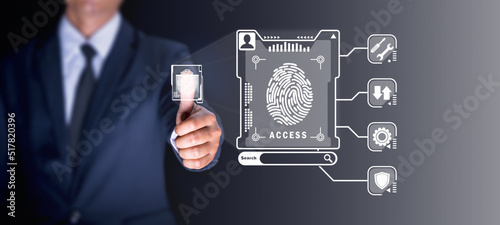 The businessman used Fingerprint scans to provide security access with biometrics identification, which is convenient but highly secure. Business technology safety internet network concept