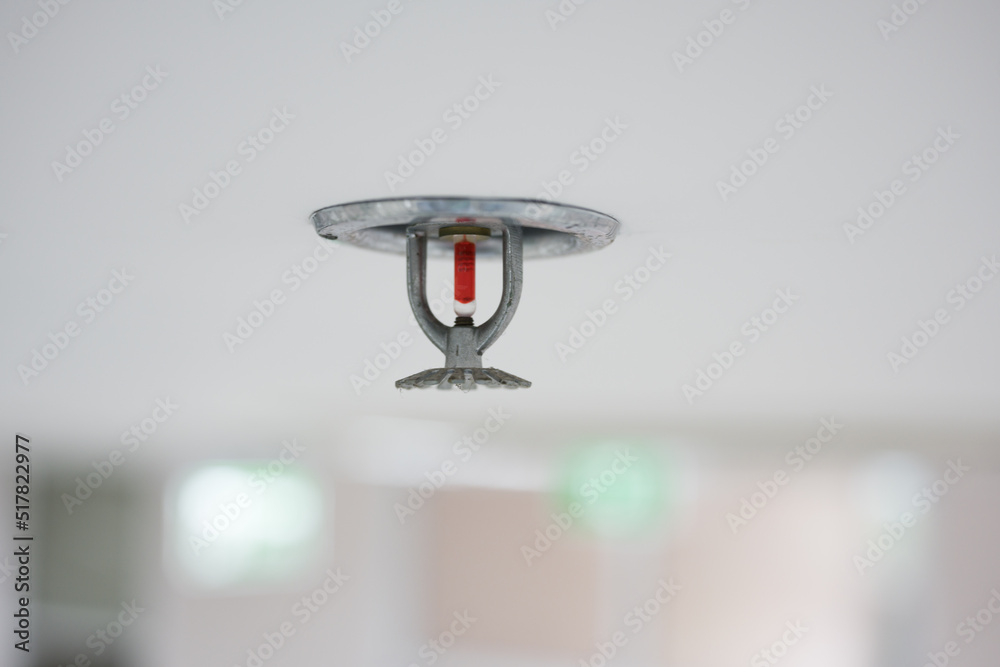 Fire fighting equipment, sprinkler on white ceiling background.Automatic head fire sprinkler extinguisher selected focus on sprinkler.Fire fighter safety concept. Fire fighting equipment, sprinkler on white ceiling background.Automatic head fire sprinkler extinguisher selected focus on sprinkler.Fire fighter safety concept.