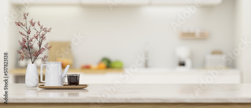 Modern kitchen countertop or tabletop with empty space over blurred kitchen in the background