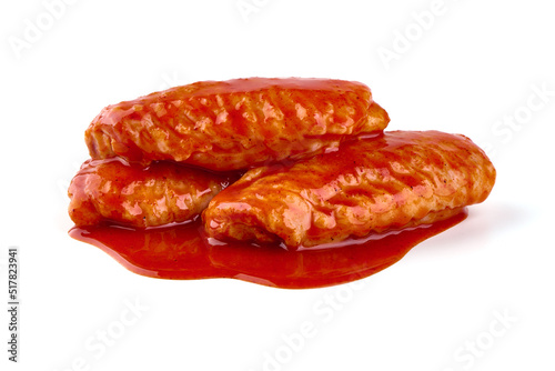 Buffalo Chicken wings in red sauce, isolated on white background.