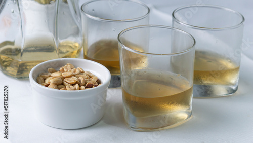 drink with nuts and side dishes