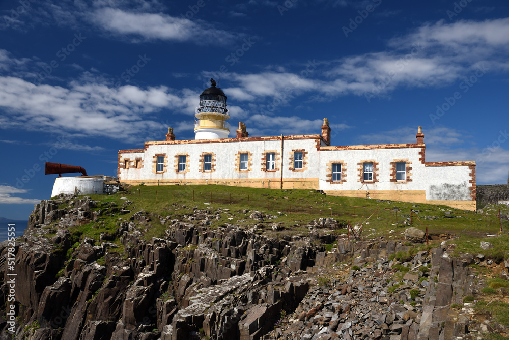 Neist Point Lighthouse Under a Blue Sky on Isle of Skye