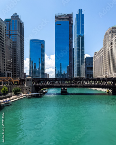 View of Chicago River on a colorful, summer afternoon with bright green water