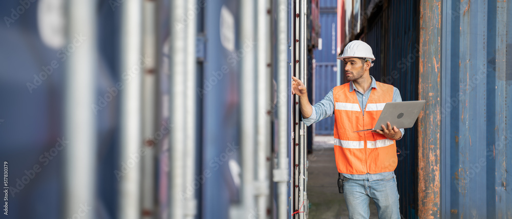 Professional industry worker of logistic concept.Engineer or foreman control loading Containers box from Cargo freight ship for import export,Engineer worker checking quantity of product in containers Professional industry worker of logistic concept.Engineer or foreman control loading Containers box from Cargo freight ship for import export,Engineer worker checking quantity of product in containers