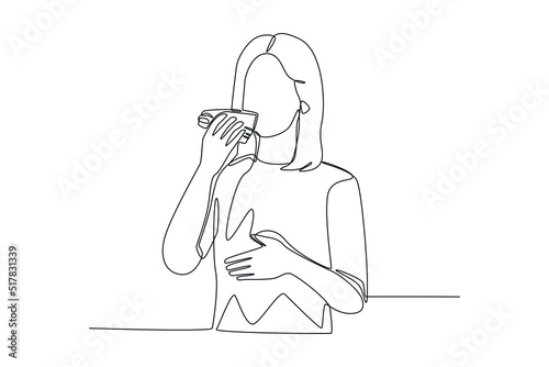 Continuous one line drawing happy woman eats sandwich with right hand. Eating activity concept. Single line draw design vector graphic illustration.