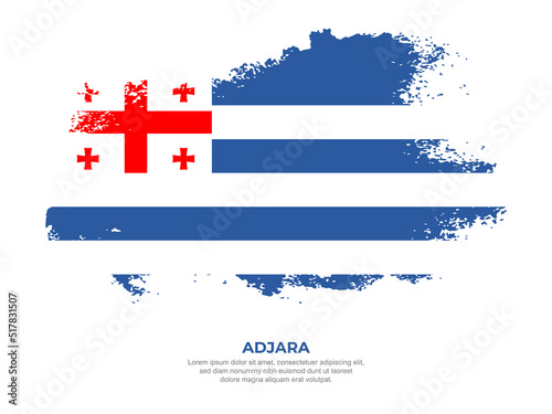Vintage grunge style Adjara flag with brush stroke effect vector illustration on solid background
