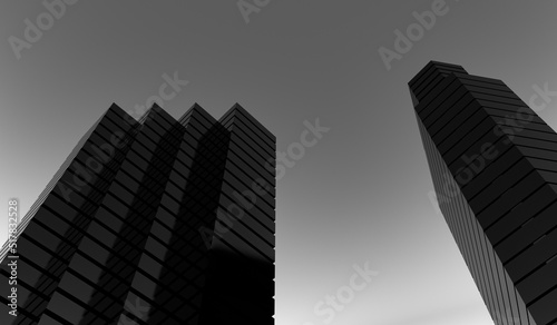 View from above modern skyscraper building monochrome black and white design.Architectural black facade design of a high rise house, building or office against a dark gray sky. 3D rendering.