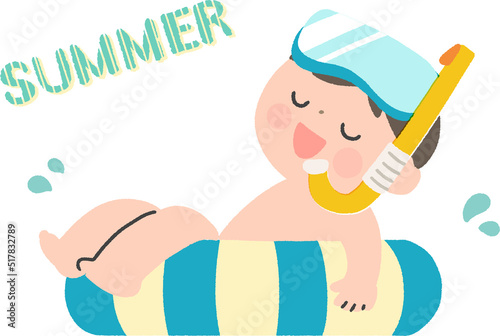 浮き輪に乗って海水浴をする男の子