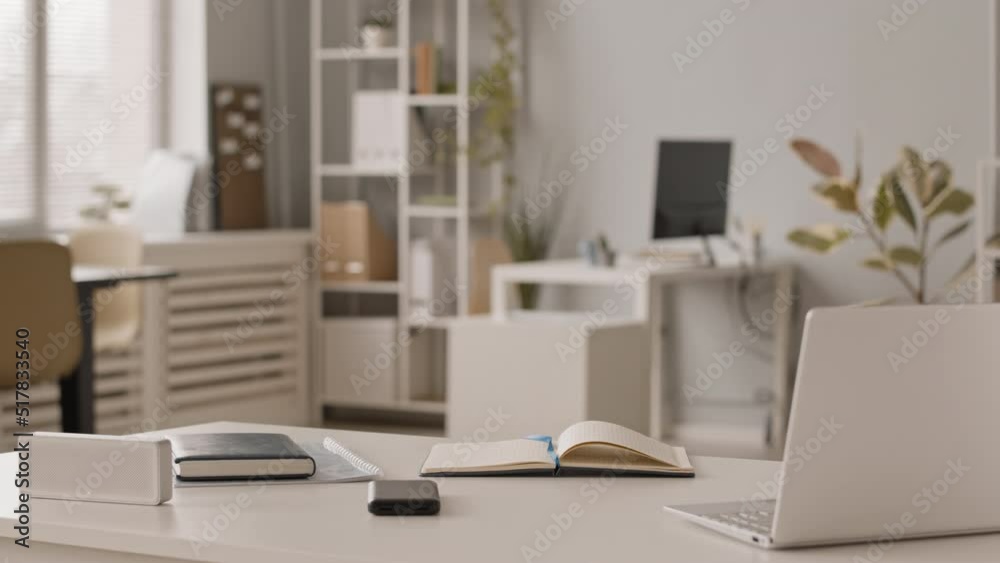 No people slowmo of workplace of hr manager with laptop and notebook on white office desk