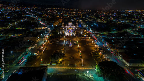 Fototapeta Naklejka Na Ścianę i Meble -  Beautiful aerial night view of the city of Cartago Costa Rica- Basilica of Our Lady of the Angels - the ruines and the Bicentennial monument 