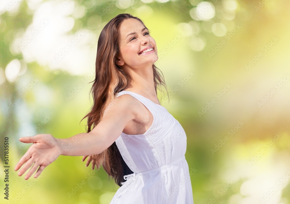 Portrait of a young woman breathing fresh air in a forest Portrait of a young woman breathing fresh air in a forest