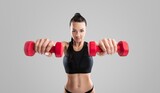 Fitness woman holds belly. Athletic girl shaped abdominal