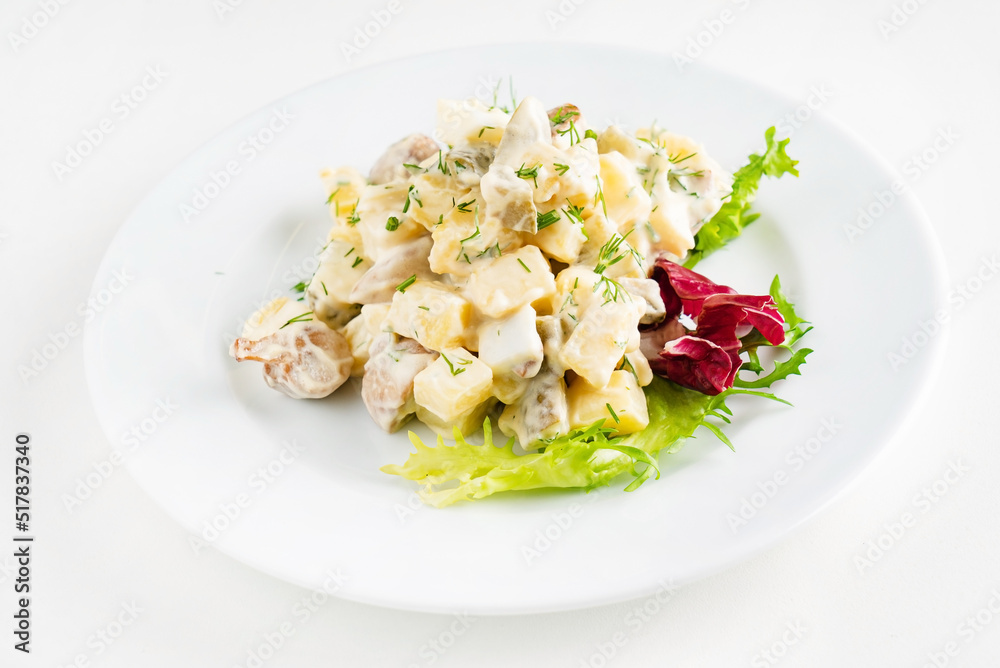 Traditional salad with cooked vegetables with mayonnaise. Traditional salad with cooked vegetables with mayonnaise.