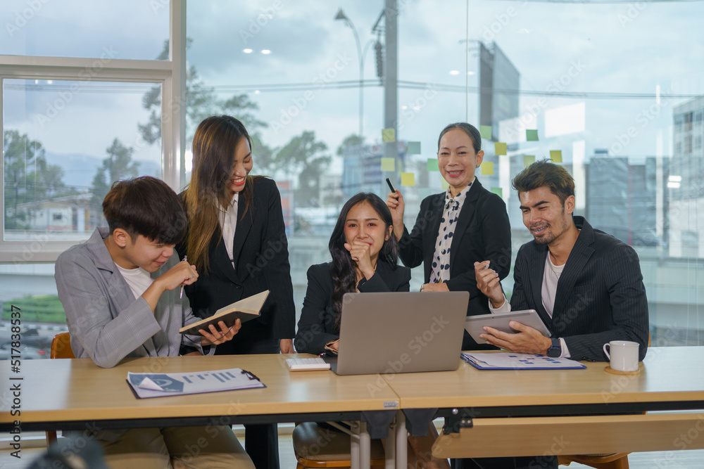 Meeting of Asian business people who are committed to work. Creative business team working together at office. Meeting of Asian business people who are committed to work. Creative business team working together at office.