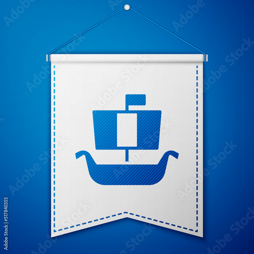 Blue Ancient viking scandinavian drakkar icon isolated on blue background. Viking transport ship. White pennant template. Vector