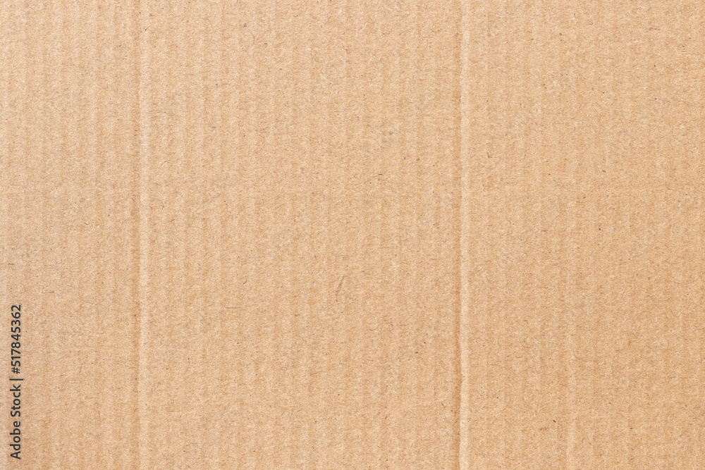 Fototapeta premium Brown cardboard sheet abstract background, texture of recycle paper box in old vintage pattern for design art work.