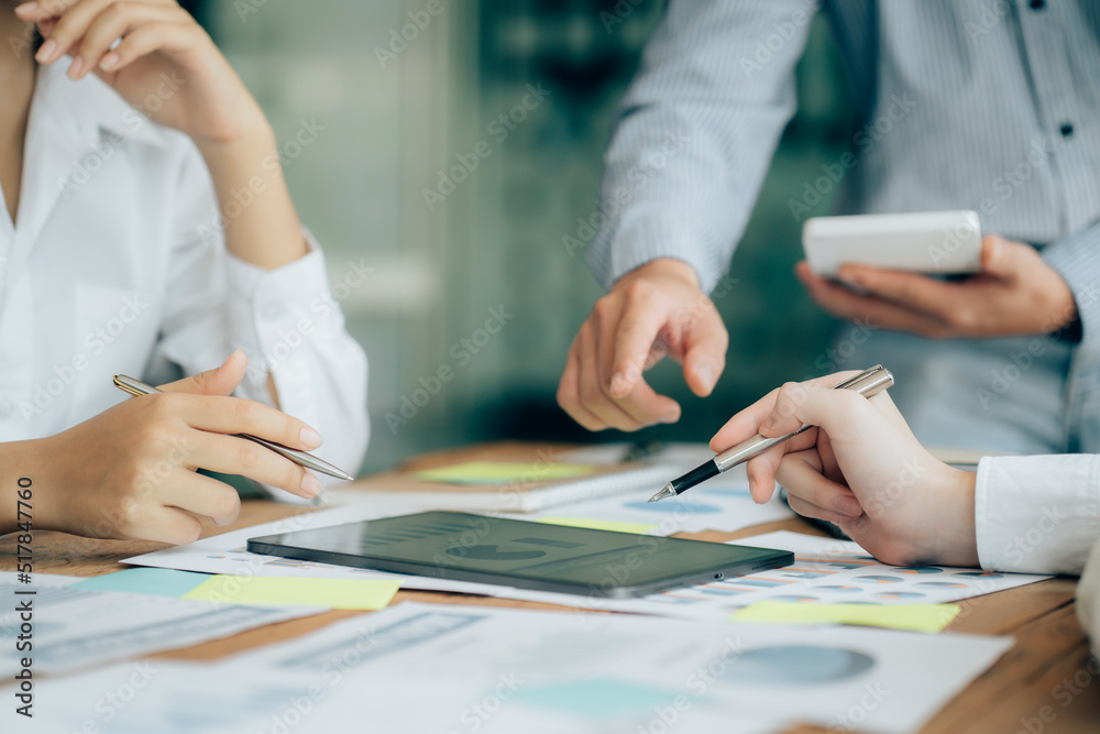 The atmosphere in the meeting room where the businessmen are meeting, information papers and charts are placed on the table to support the business planning meeting to grow. Business idea The atmosphere in the meeting room where the businessmen are meeting, information papers and charts are placed on the table to support the business planning meeting to grow. Business idea