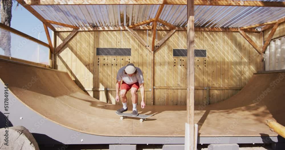 Video of caucasian male skateboarder training in skate park Video of caucasian male skateboarder training in skate park