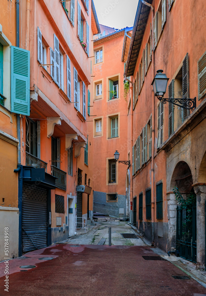 Narrow crooked street in the Old Town, Vieille Ville in Nice, French Riviera