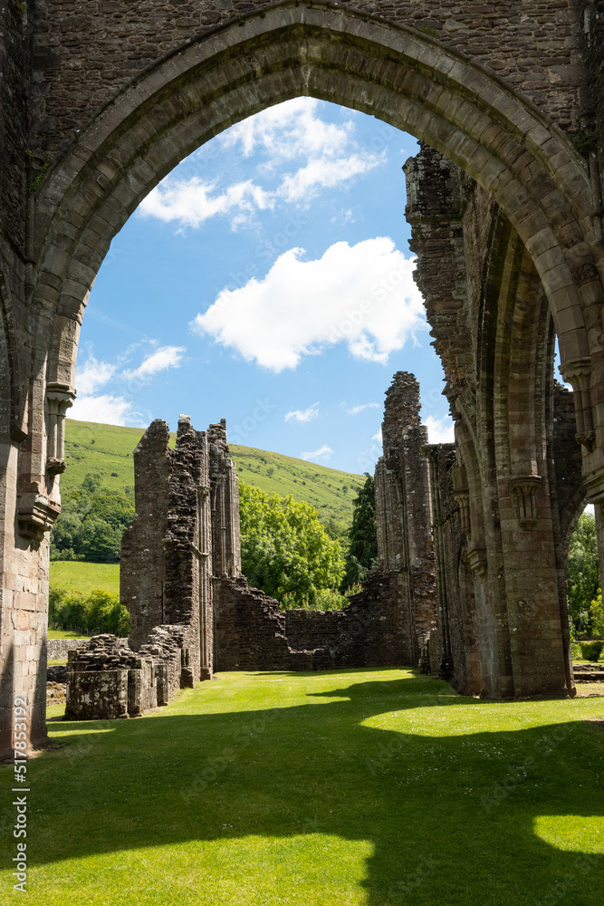 A section of the ruins of Llantony Priory near Abergavenny in Wales UK next to the Brecon Beacons Black Mountains. this medieval structure is a popular attraction to visitors and tourists