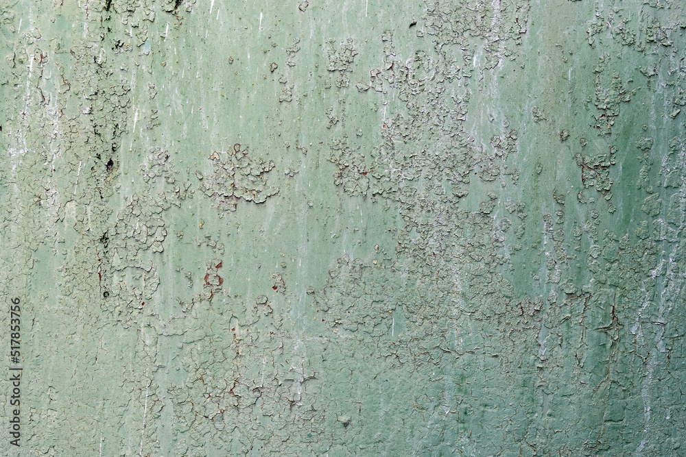 Worn and peeling paint on a metal surface. Abstract background. Vintage.