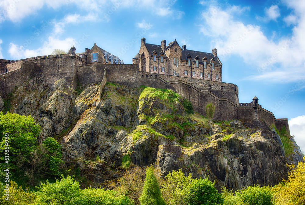 Castle hill in Edinburgh with green grass and blue sky, Scotland, UK